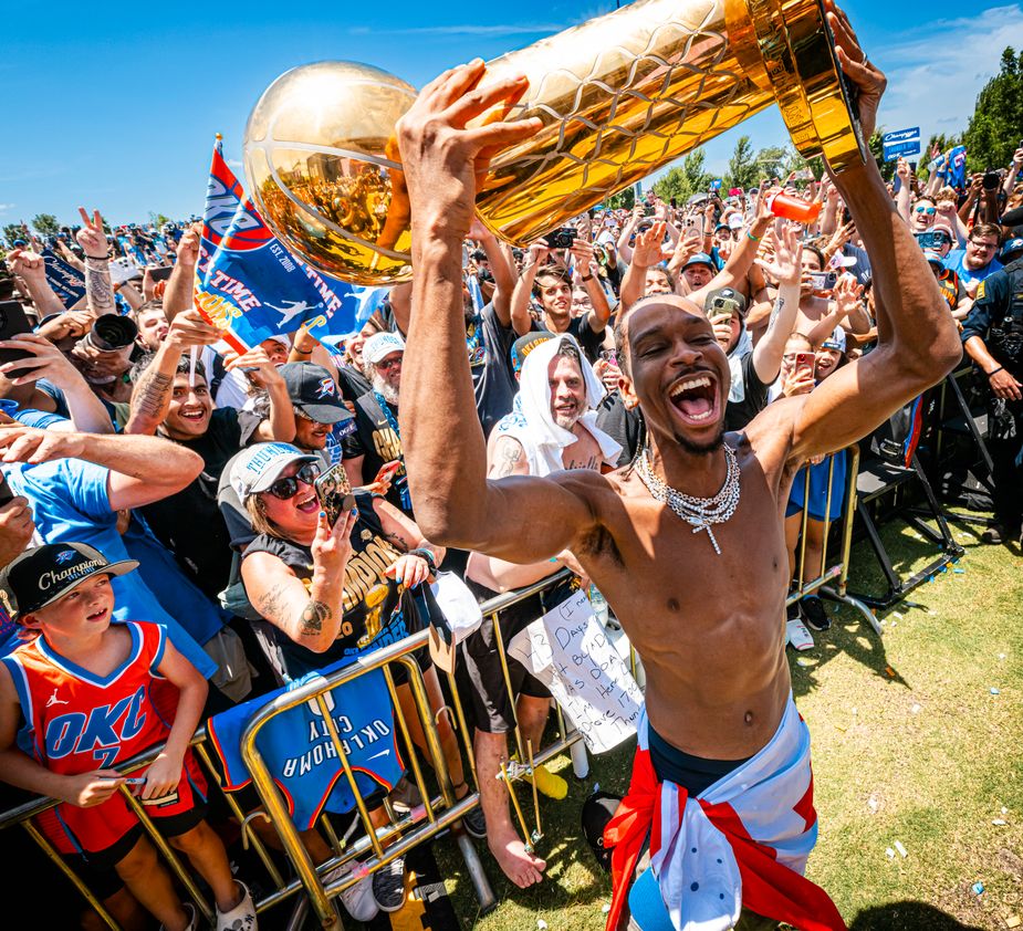 Shai Gilgeous-Alexander celebrates amongst the fans during the Thunder Championship Parade in downtown Oklahoma City. Photo by Zach Beeker