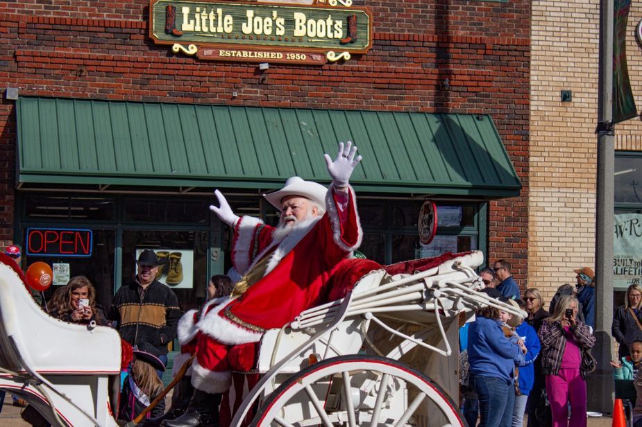 See Santa swap his trademark stocking cap for a trusty ten gallon at the Cowboy Christmas parade in Oklahoma City's Stockyards District. Photo courtesy Stockyards City