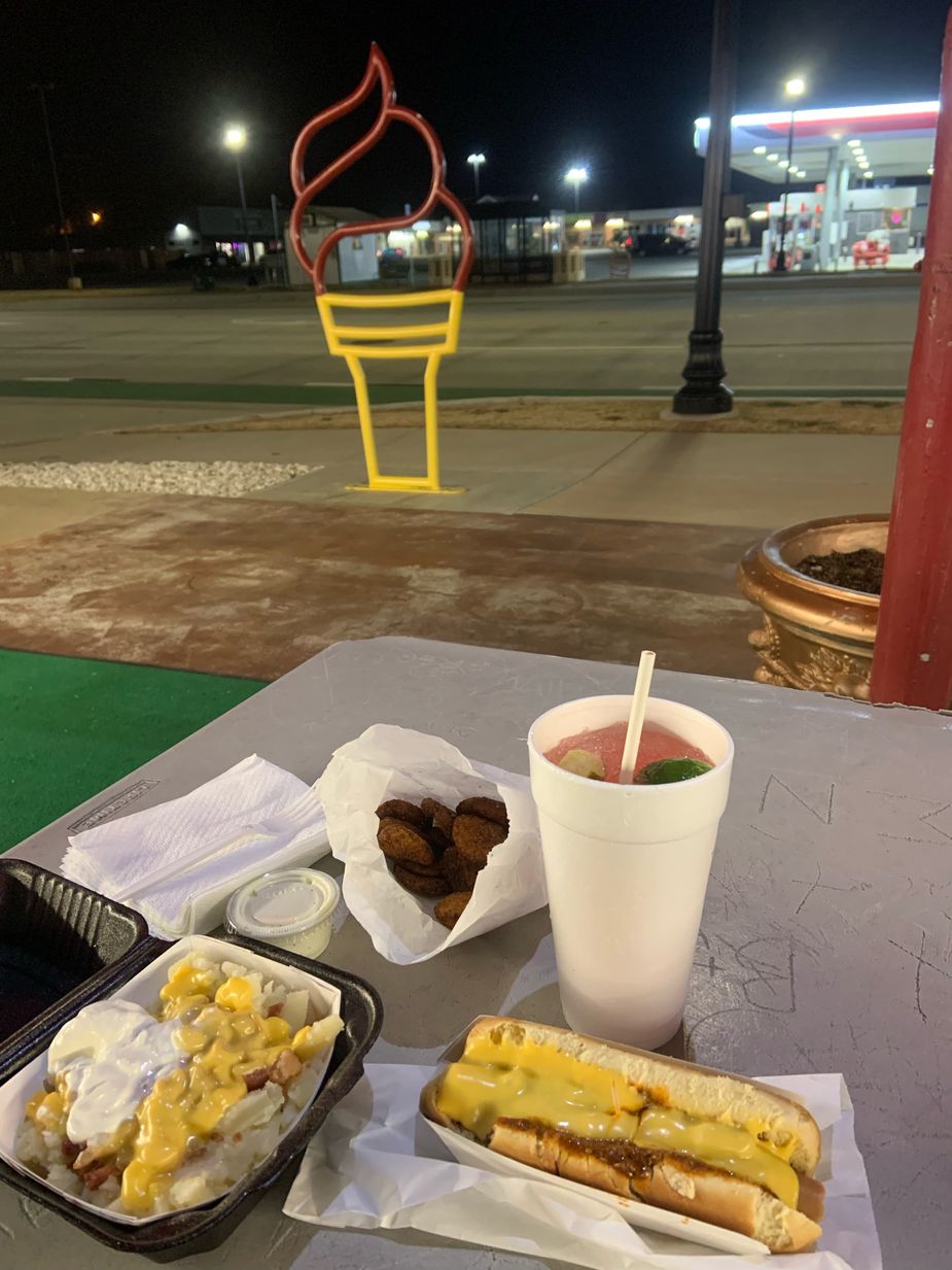 Hop out of the car and grab a seat at an outside table at Classic 50's Drive-Inn to enjoy a meal al fresco. Photo by Ben Luschen
