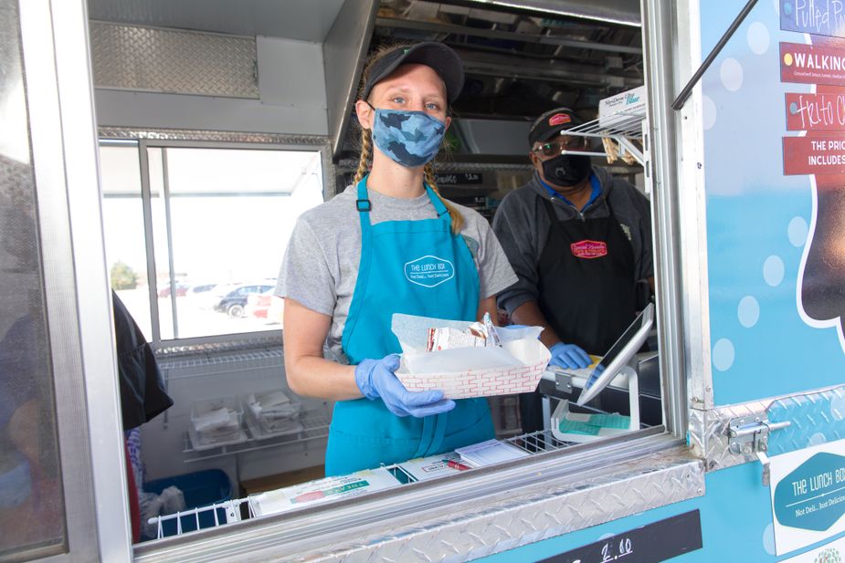 Proper food safety is one of the many skills Special Kneads' clients learn working the popular Shawnee food trailer. Photo by Brent Fuchs