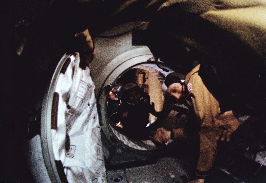 Stafford and cosmonaut Aleksei A. Leonov shake hands in space during the Apollo-Soyuz Test Project. Photo courtesy NASA